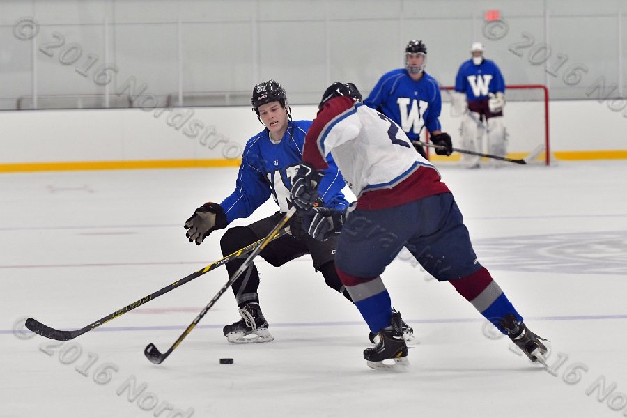 Wheaton College Men\'s Ice Hockey vs Middlesex Community College. - Photo By: KEITH NORDSTROM